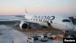 Самолёт Finnair в аэропорту Хельсинки, иллюстративное фото