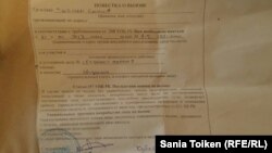 Повестка с требованием явиться в полицию, врученная Сание Тойкен 21 января.