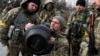 UKRAINE – New members of the Territorial Defence Forces train to operate NLAW anti-tank launcher during military exercises amid Russia's invasion of Ukraine, in Kyiv, March 9, 2022