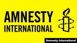 Amnesty International təşkilatının loqosu